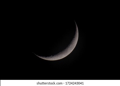 Low Angle View Of Moon Against Clear Sky At Night
