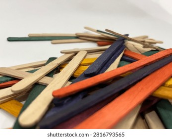 Low Angle View of Multi Colored Wooden Popsicle Sticks Pile