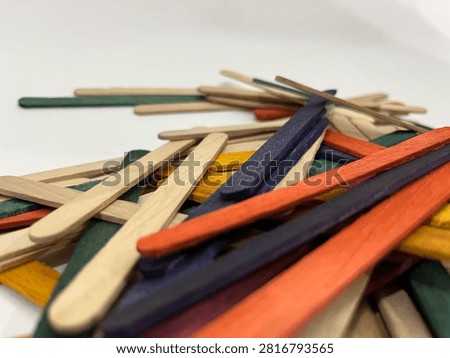 Low Angle View of Multi Colored Wooden Popsicle Sticks Pile