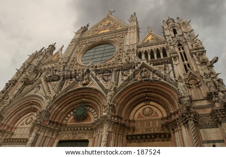 Low angle view of an ornate cathedral, Siena, Tuscany, Italy,