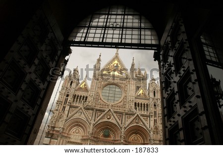 Low angle view of an ornate cathedral, Siena, Tuscany, Italy,