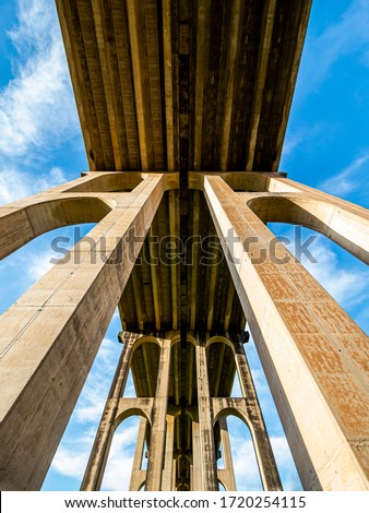 Low angle view of pillars of the supporting structure of a bridge