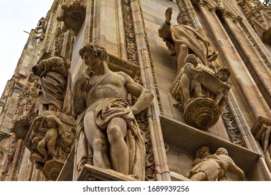 Low Angle View Of Richly Decorated With Spires,statues Magnificent  Building Of Milan Cathedral-Duomo Di Milano Rainy Spring Day,