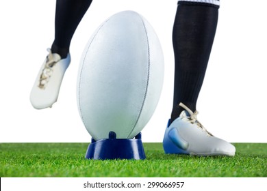 Low Angle View Of A Rugby Player Doing A Drop Kick