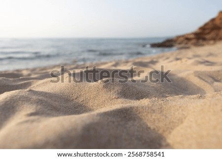 Low Angle View of Sand by the Sea