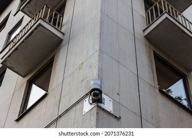 A low angle view of security camera on the building