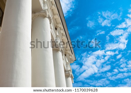 Low angle view of sky and columns Architectural Column Against clear Blue Sky