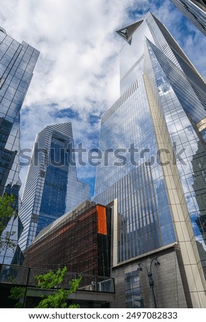 Low angle view of skyscraper with Sky deck observatory Edge in Hudson Yards