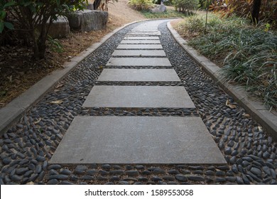 Low angle view of slate and cobblestone path in the park