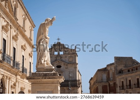 low angle view of statue in square in Siracusa, Sicily, Italy