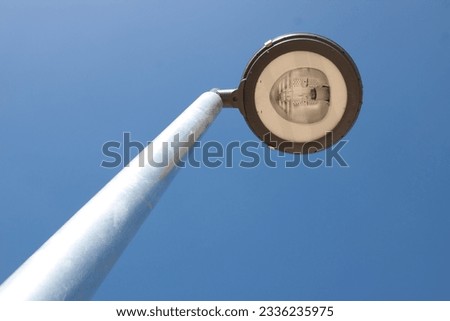 low angle view of street lights against a cloudy sky background vintage, traditional, country lights