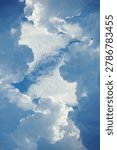 Low Angle View Of Thick Cumulus Clouds Framing Center Sky Opening