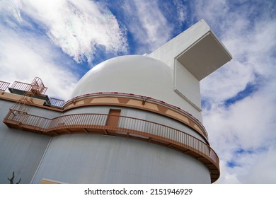 Low angle view of the University of Hawaii 2.2-meter telescope at the summit of the Mauna Kea volcano on the Big Island of Hawaii, United States