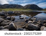 Low angle views of the lake and distant hills near Hushinish on Harris in Scotland