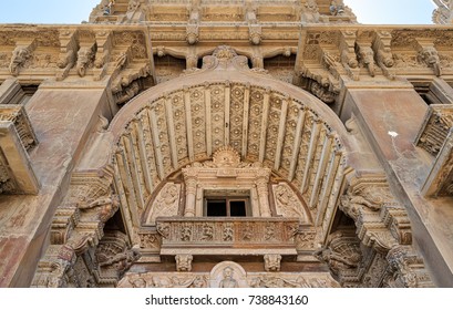 Low angled view of  external facade of Baron Empain Palace, Heliopolis district, Cairo, Egypt - Shutterstock ID 738843160