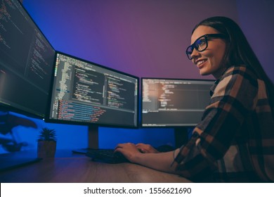 Low below angle view photo of cheerful woman finishing developing computer game solving all the current problems