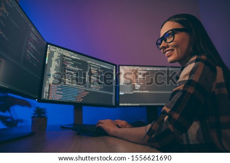 Low below angle view photo of cheerful woman finishing developing computer game solving all the current problems