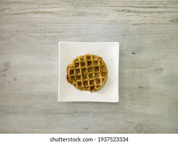 Low Carb Chaffle Or Waffle Made With Broccoli Tots.