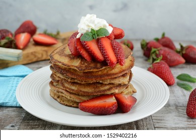 Low Carb Keto Diet Pancakes with Strawberries and Butter. A set of photos showing an entire recipe preparation with instructions and photos of the final dish. 