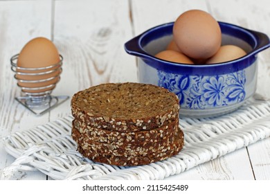 Low Carbohydrate Diet.Low Carb Bread With Eggs On A Cutting Board.