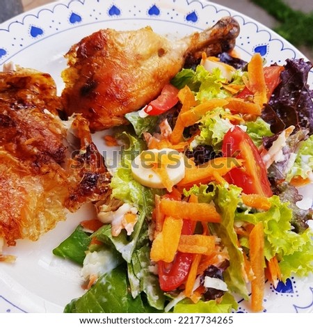 Low carbohydrate meal with roasted chicken and fresh salad for healthy life. Paleo food. Colorfull lowcarb meal.
