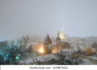 Low Cloud And Heavy Snowfall Resulting Fairy-tale Like Nighttime Scene From The Patkuli Viewing Platform, Situated In Toompea Hill,  One Of The Most Ancient Parts Of Tallinn, Incl St Olaf Church