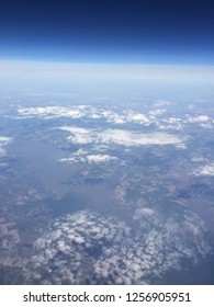 Low clouds over fields from aerial view