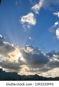 Low clouds with sun breaking through