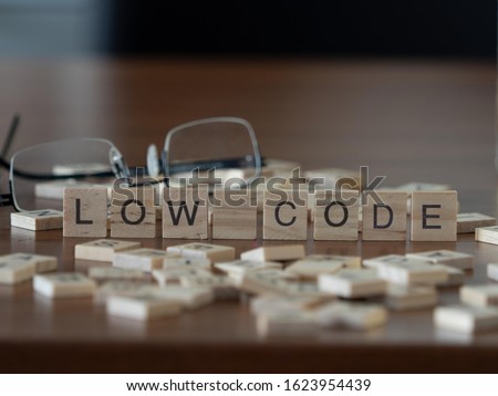 low code concept represented by wooden letter tiles ストックフォト © 