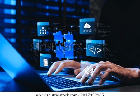 Low code no code development platform concept. Programmer using laptop, showing digital puzzle pieces connecting software modules, drag and drop app coding, application for rapid solution building