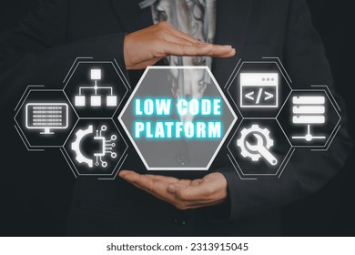 Low Code software development platform technology concept, Woman hand holding Low Code software development platform icon on virtual screen.