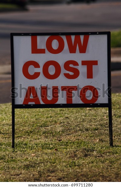LOW COST AUTO\
SIGN