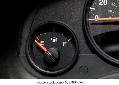 Low Fuel Guage Shown In A Car Shot Close Up