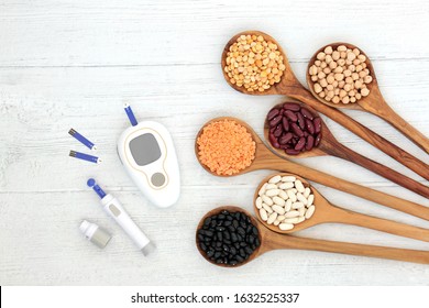 Low GI Health Food For Diabetics With Blood Sugar Testing Monitor & Lancing Device With Legumes In Spoons High In Vitamins, Minerals, Anthocyanins, Antioxidants, Smart Carbs. Below 55 On The GI Index.