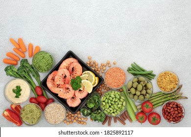 Low glycemic health food for diabetics with vegetables,  seafood, dips, nuts & pasta. All foods below 55 on the GI index. High in antioxidants, vitamins, minerals, protein, omega 3 & smart carbs.  - Shutterstock ID 1825892117