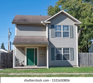 Low Income House with Green Door