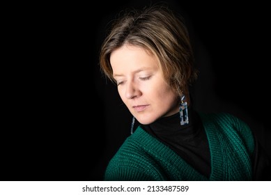 Low Key Expressive Fashion Portrait Of A 35 Year Old White Woman