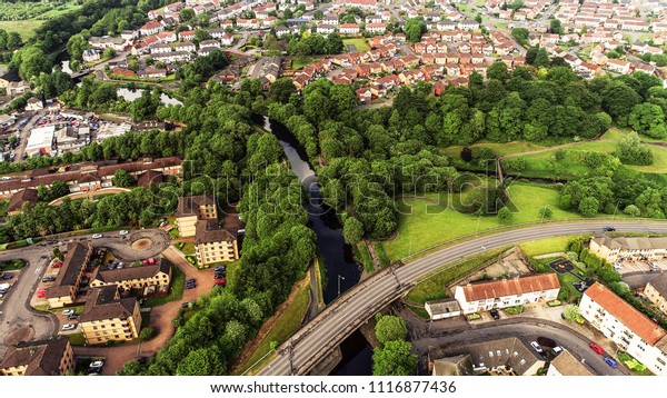 Low level aerial image of the town of\
Kirkintilloch in Scotland.