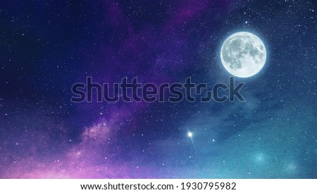 Low light and long exposure photography of the infinite deep space cosmos. Grainy texture and soft-focus background. Night sky Milky way with full Moon and universe constellation s in the background. 