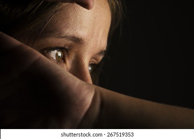 Low Light Portrait Of Young Woman.