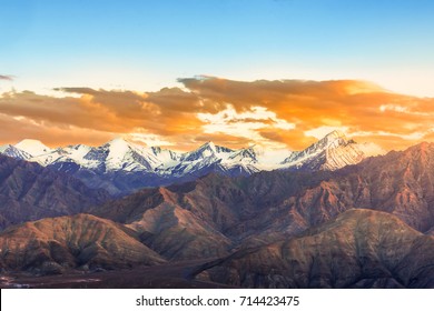 Low light scenery of sunset over the snow mountain - Shutterstock ID 714423475