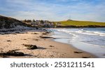 Low Newton Village from the sandy beach, also known as Low Newton-by-the-sea its a small fishing village on the North Sea coastline in Northumberland