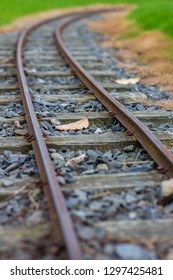 Low Perspective Image Of Narrow Guage Railroad Tracks For A Children's Train In Agnew Park, Stranraer, Scotland, United Kingdom