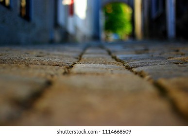 Low perspective of a tiny, less trafficked pedestrian austrian alley.