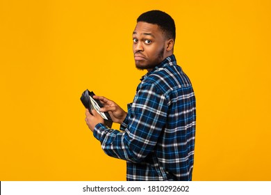 Low Salary Discontented Black Man Holding Stock Photo (Edit Now) 1810292602