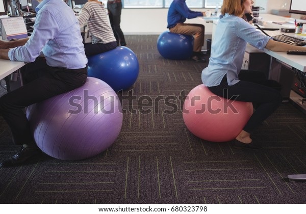 Low Section Business People Sitting On Stock Photo Edit Now