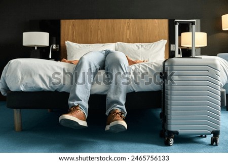 Similar – Image, Stock Photo Unrecognizable man in sneakers stretching leg and doing exercise on road