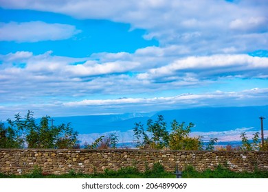 Low Stone Fence In The Countryside