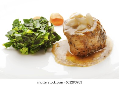 Low Temperature Cooked Fillet Mignon Served  On A Juicy  Sauce With Vegetables And White Asparagus On Top. Gourmet Main Course.