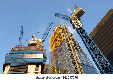 Low View Of The Cranes To Build New Skyscrapers In The City Of London